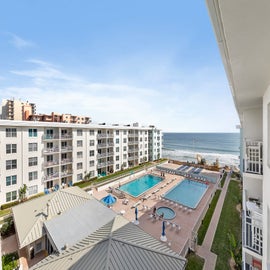 Pool and beach views from balcony!